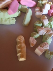 Eskimo kiwi lollies getting cut up. Not PC but A OK in NZ!