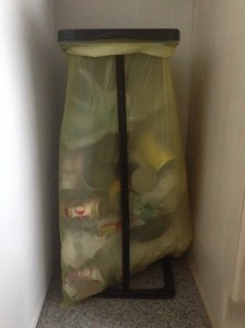 The yellow sack in action - stands like this can be purchased at grocery stores such as Globus